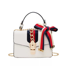 Load image into Gallery viewer, Strip Handbag with gold chain
